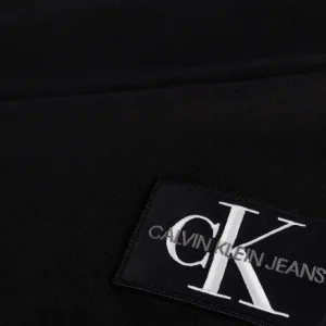 Calvin Klein T-shirt Monogram Badge Ls Round Hem Tee En Noir Livraison Standard/Rapide 15