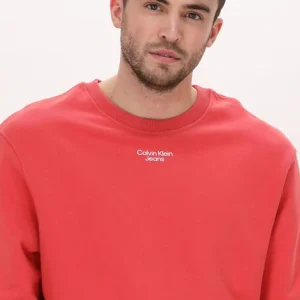 jusqu'à Calvin Klein Chandail Stacked Logo Crew Neck En Orange 11