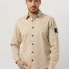 Calvin Klein Surchemise Monologo Badge Relaxed Shirt En Beige remise en ligne 19