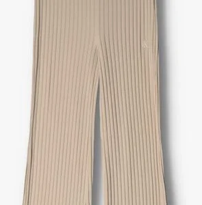 Calvin Klein Pantalon évasé Elongated Rib Pants En Beige dernière tendance 13